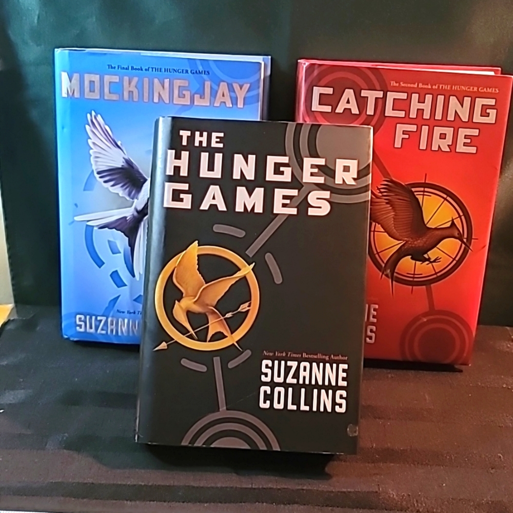 Full set of EUC hardcover books The Hunger Games, Catching Fire, Mocking Jay